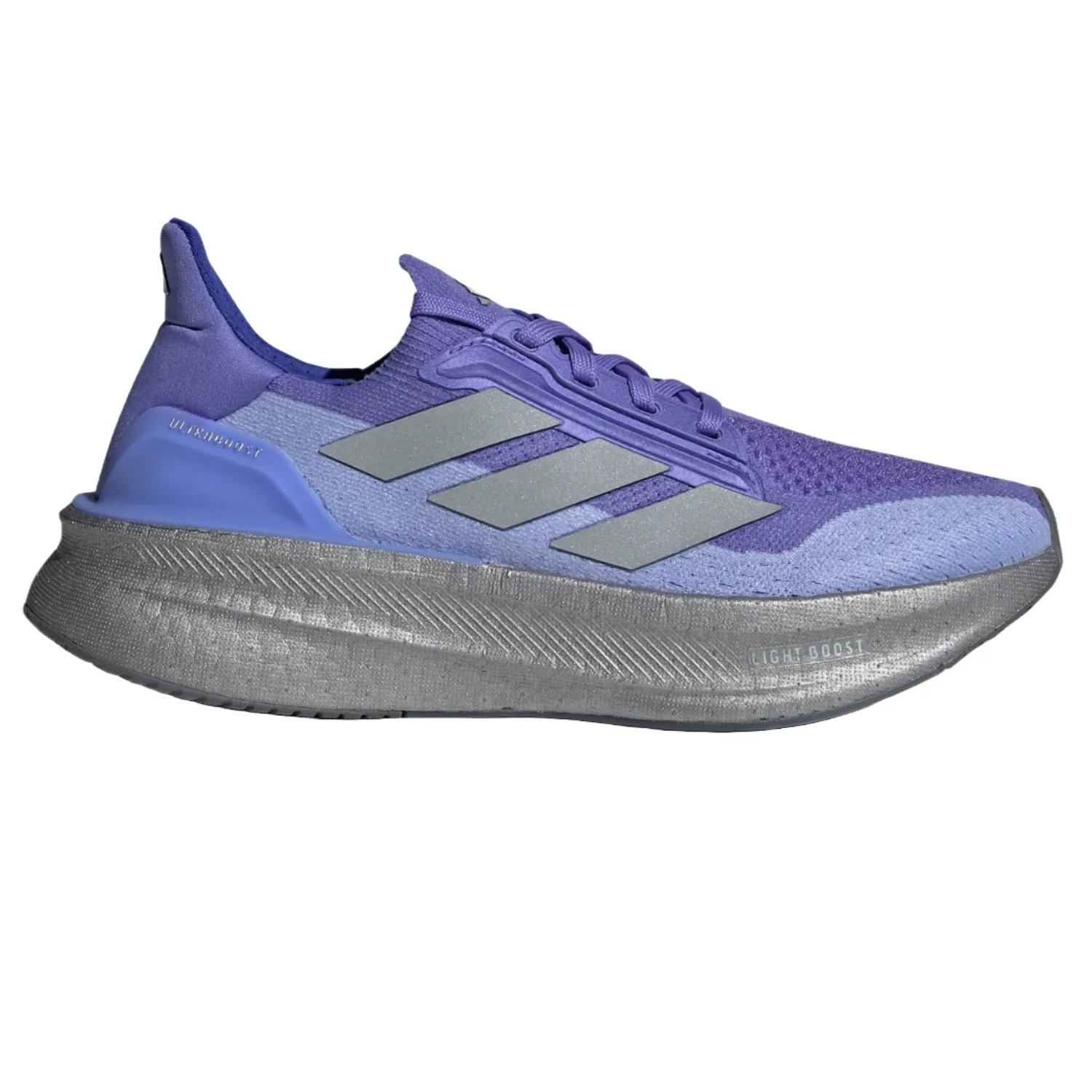 Adidas Women's Ultraboost 5x Shoes feature a purple knit upper with silver stripes and a supportive heel counter. They have a thick, textured gray midsole labeled \“Light Boost\“ for enhanced cushioning and comfort.