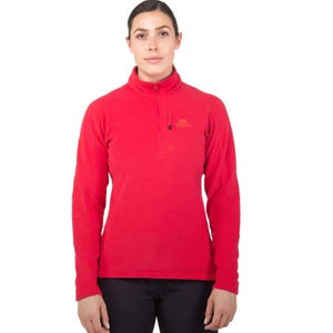 A person wearing a bright red, long-sleeved fleece pullover with a half-zip and small logo on the chest, paired with black pants.