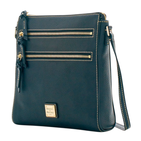 A dark blue crossbody bag featuring two front zippered pockets with tassel accents and a gold-tone metal logo plate at the bottom.