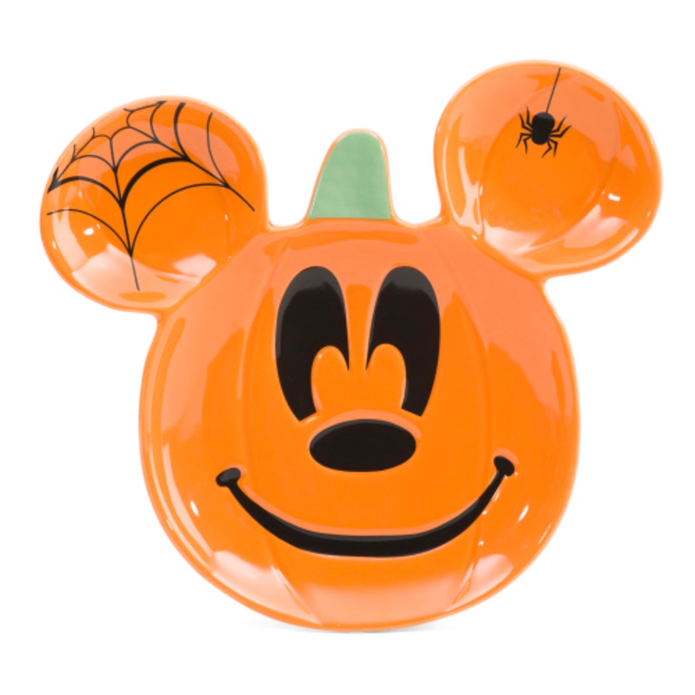 An orange, pumpkin-themed plate shaped like a well-known cartoon character's head, featuring a spider web and spider on the ears.