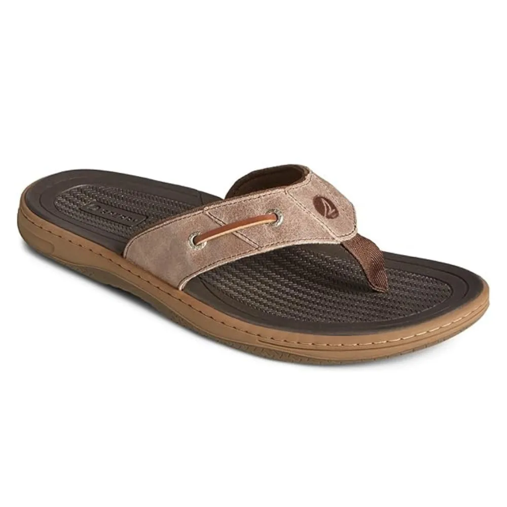 Brown flip-flop sandal with a textured footbed and leather strap featuring metal eyelets, designed for casual wear.