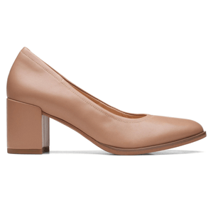 Beige block-heeled pump with a rounded toe and smooth finish.