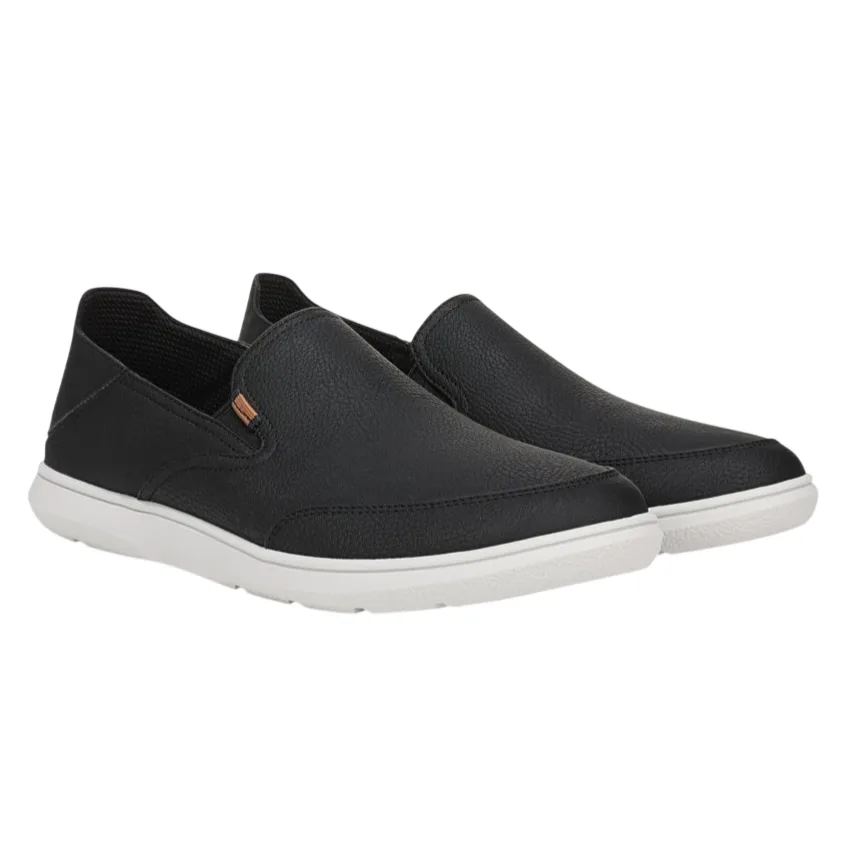 Black slip-on shoes with white rubber soles, featuring a textured surface and elastic side accents.