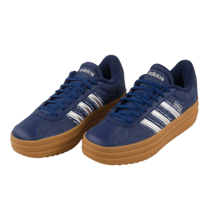 A pair of blue Adidas sneakers with white stripes and gum rubber soles.