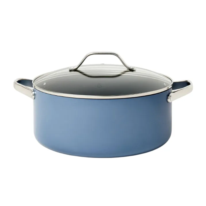 A blue cooking pot with a glass lid and stainless steel handles is pictured, suitable for versatile stovetop cooking.