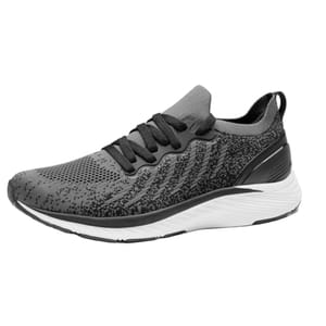 Men's sneaker with a knit upper in gray and black, featuring a speckled pattern and black laces. It has a contrasting white and black sole and a pull tab on the heel for easy wearing.
