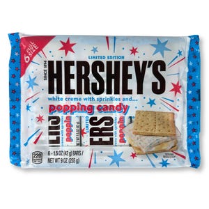 Limited Edition Hershey's Popping Candy Bars feature white creme with sprinkles and popping candy. The package contains 6 full-size bars, each weighing 1.5 oz, with a total net weight of 9 oz (255 g).