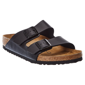 Black sandal with two adjustable straps and buckles on a cork footbed and rubber sole.