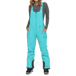 A woman is wearing a pair of turquoise ski bib pants with a zippered front and adjustable straps, paired with a dark gray long-sleeve shirt.