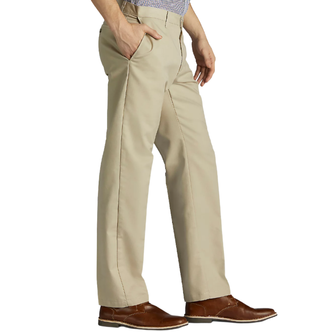 A person is wearing beige khaki pants and brown shoes. The pants have a straight-leg cut and side pockets.