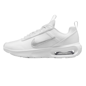 A white Nike sneaker featuring the Air Max cushioning with a swoosh logo, lace-up design, and a pull tab on the heel.
