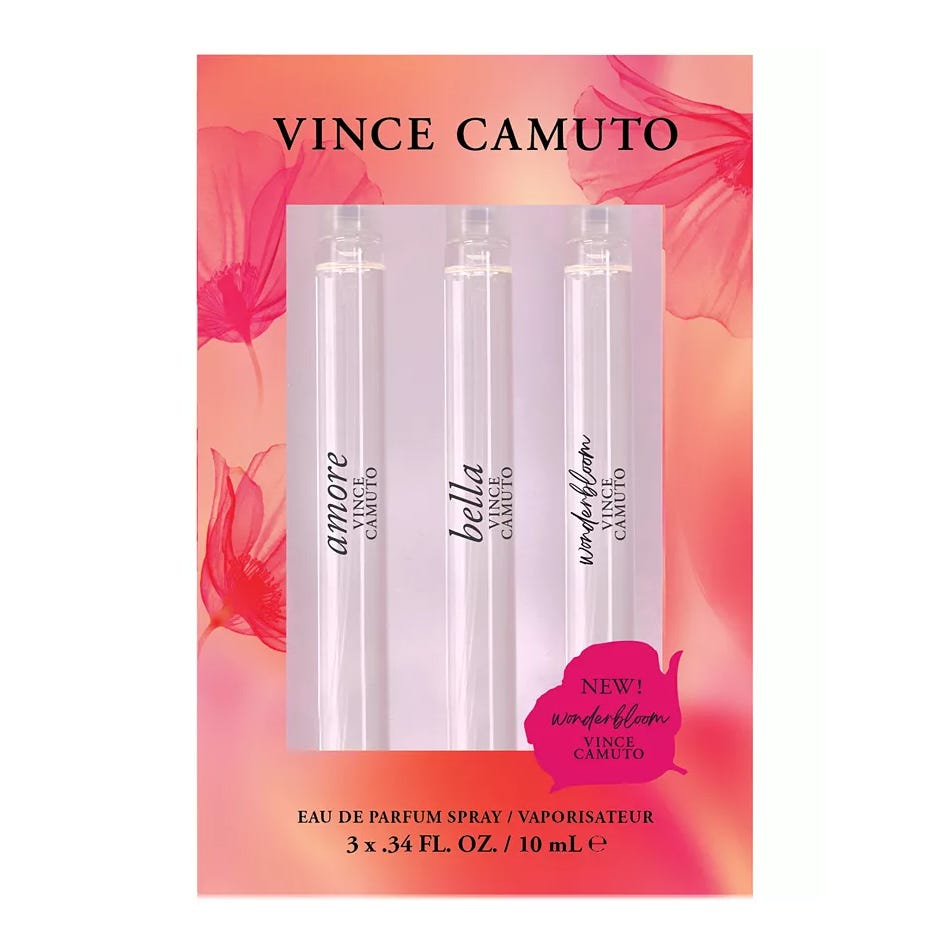 Vince Camuto 3-piece perfume set includes Amore, Bella, and Wonder Bloom Eau de Parfum sprays, each 10 mL (0.34 fl. oz). The package features a floral design with pink and red hues.