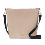 A beige Kate Spade New York crossbody bag with black adjustable strap and gold hardware accents.