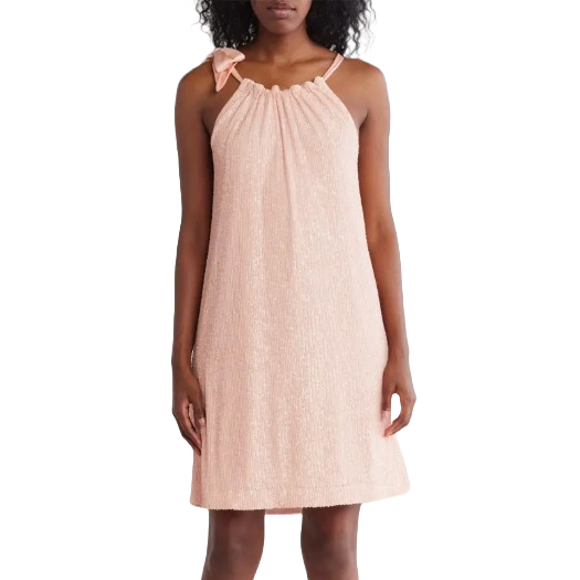 A sleeveless pink shift dress adorned with sequins, featuring a gathered neckline and a small bow on one strap.