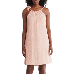 A sleeveless pink shift dress adorned with sequins, featuring a gathered neckline and a small bow on one strap.