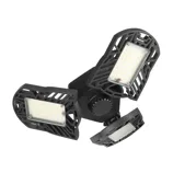 LED garage light with three adjustable panels for directional lighting, featuring black housing and multiple LED bulbs.