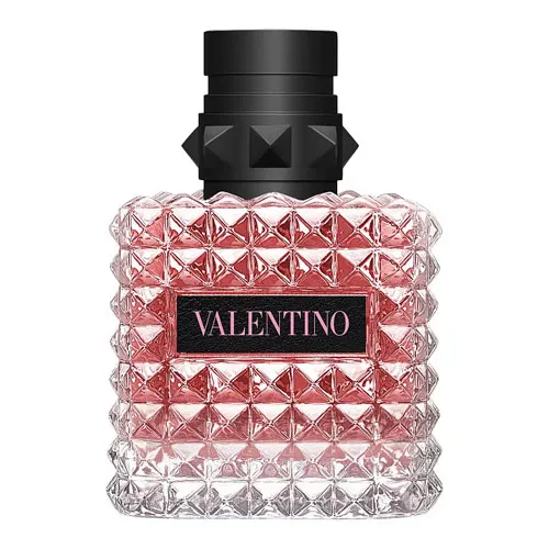 A pink glass bottle with a studded texture and a black cap, labeled \“Valentino.\“