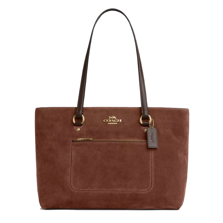 A brown suede Coach tote bag with dual leather handles, featuring a front zip pocket and the Coach logo in gold-tone hardware.