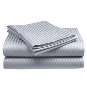 A set of 100% cotton sheet sets with a 400 thread count, featuring a subtle striped pattern in light gray. The set includes a flat sheet, a fitted sheet, and pillowcases.