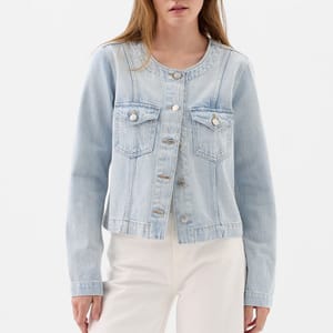 Light blue denim jacket with button front, two chest pockets, and a classic collar; the sleeves and hem have a slightly faded wash.