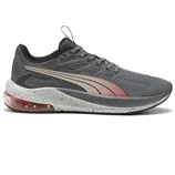 Grey athletic sneaker with a speckled white midsole, featuring a translucent red air cushion and gradient Puma logo.