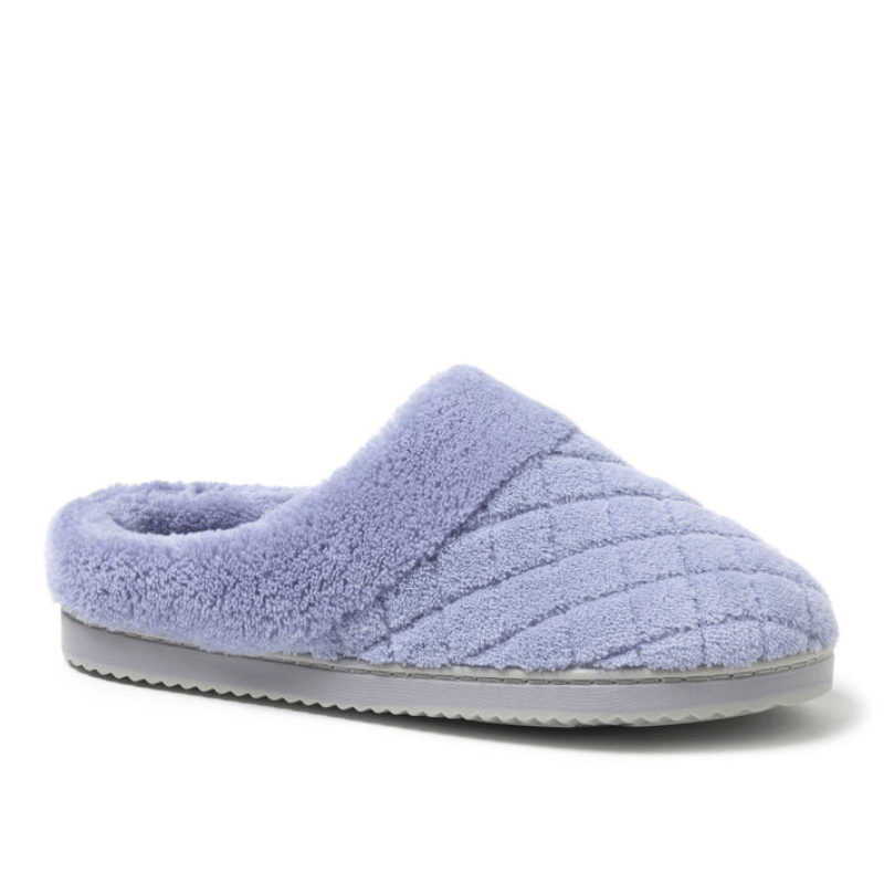 A light purple slipper with a quilted terry material and a plush, fluffy cuff around the opening. It features a flat, durable sole for indoor use.