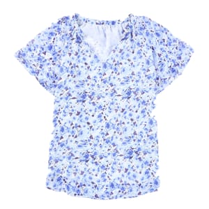 Short-sleeve floral blouse featuring a blue and white pattern with a V-neck and light ruffle detailing at the shoulders.