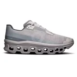 A gray athletic shoe with a distinctive geometric sole design featuring CloudTec technology, offering a sleek and modern look.