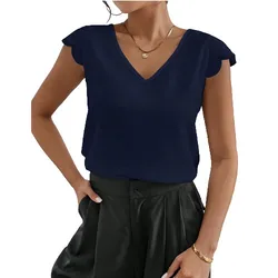 A navy blue, short-sleeve V-neck blouse paired with high-waisted, black pleated trousers. The outfit is accessorized with a gold necklace and bracelet.