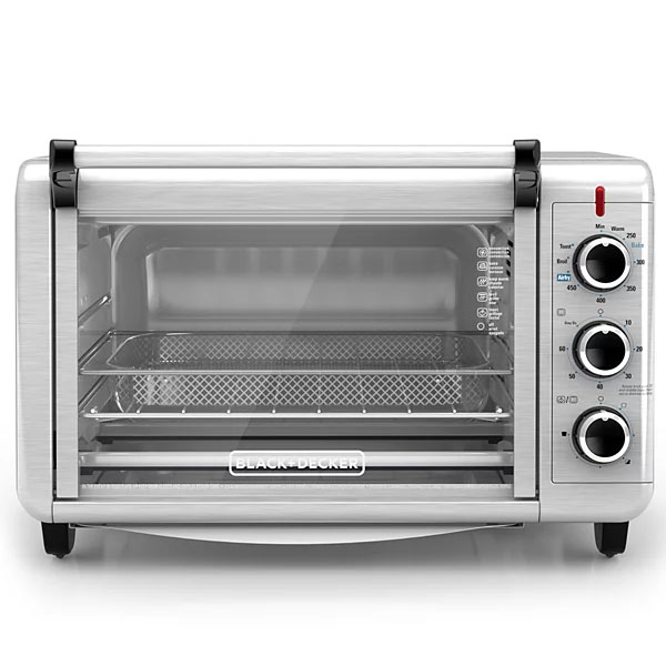 A Black+Decker countertop convection toaster oven with dials for temperature, function, and timer settings.