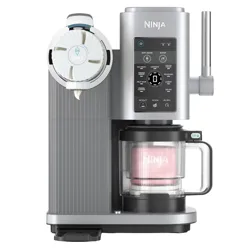 Ninja ice cream maker with a sleek design, featuring controls for making various frozen treats like ice cream, gelato, and smoothies. Includes a transparent mixing container and a spout for dispensing.