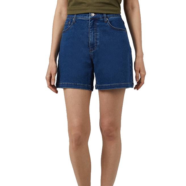 Blue high-waisted denim shorts paired with a green top.