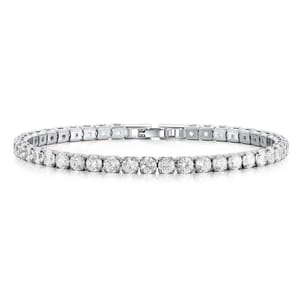A tennis bracelet featuring a series of uniformly set round diamonds in a symmetrical line, secured by a clasp on a metal band, likely made of white gold or platinum, offering a classic and elegant design.