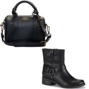 A black leather handbag with gold accents and a black leather ankle boot with buckle details.