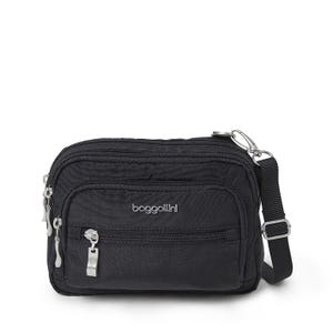A black Baggallini crossbody bag with multiple zippered compartments and an adjustable strap.