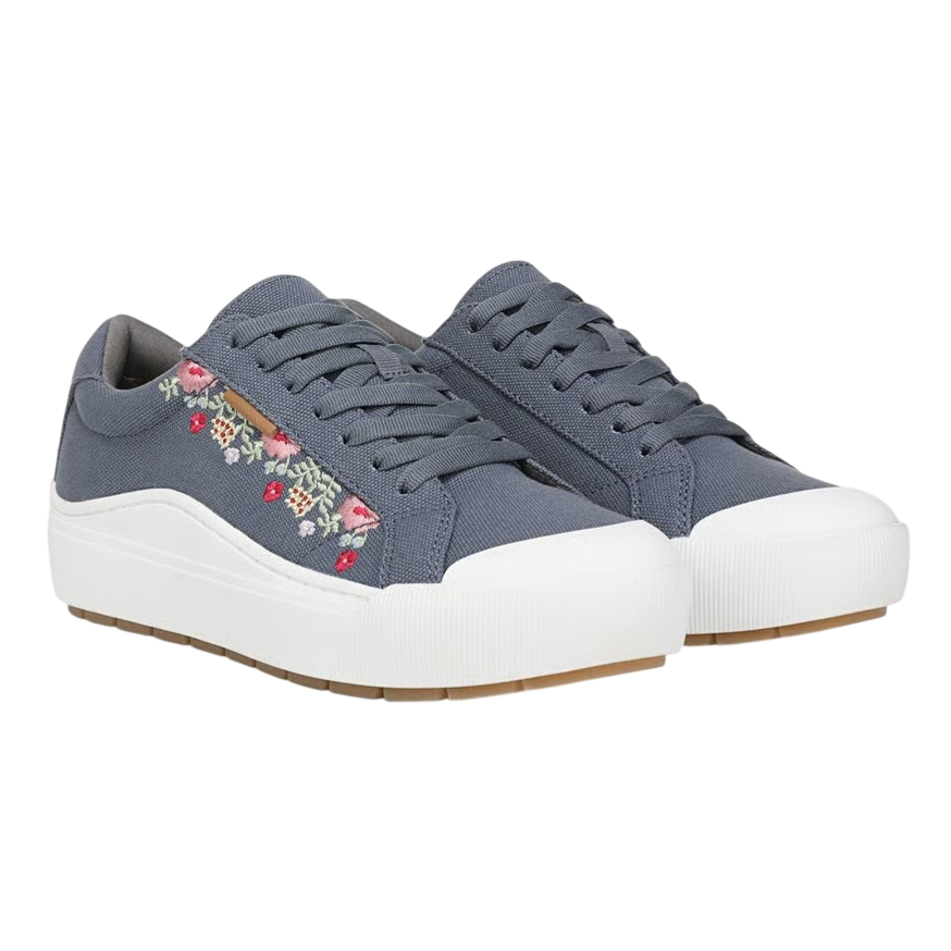 Blue canvas sneakers with white soles, featuring floral embroidery on the sides.