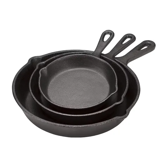 A set of three cast iron skillets in varying sizes with handles.
