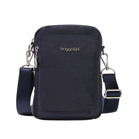 A compact, navy blue crossbody bag with a detachable strap, featuring a front zippered pocket and silver hardware.