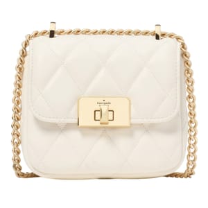 Kate Spade Micro Flap Crossbody in quilted white leather features a gold-tone turn-lock closure and a matching chain strap.