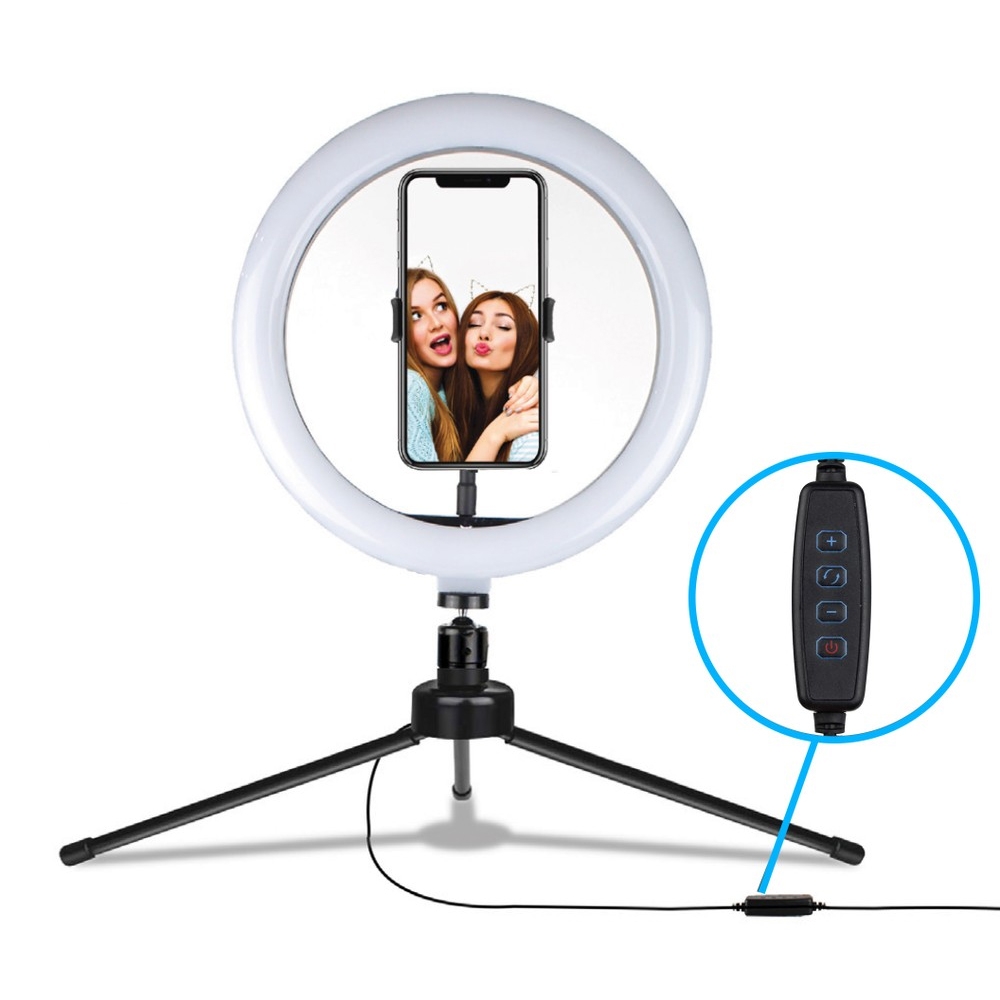 Ring light with a smartphone holder on a tripod stand, featuring a wired remote control for adjusting brightness and power.