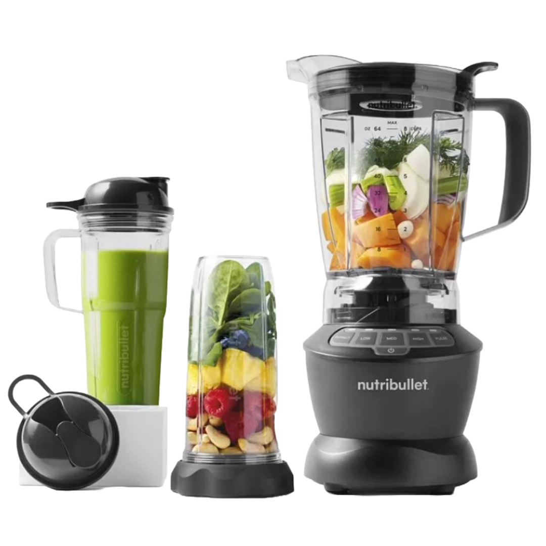 The NutriBullet Blender & Cup Set includes a blender base with a large pitcher filled with various fruits and vegetables, a tall cup with a green smoothie, and a smaller cup containing nuts, berries, and greens, all featuring secure lids.