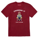A red T-shirt features a graphic of a nutcracker with the text \“CRUSHING IT\“ above and \“LIFE IS GOOD\“ below.