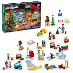 A LEGO Friends Advent Calendar displaying a Christmas-themed set with multiple buildable mini-models and two mini-doll figures. The set features holiday decorations, gifts, and wintertime accessories.