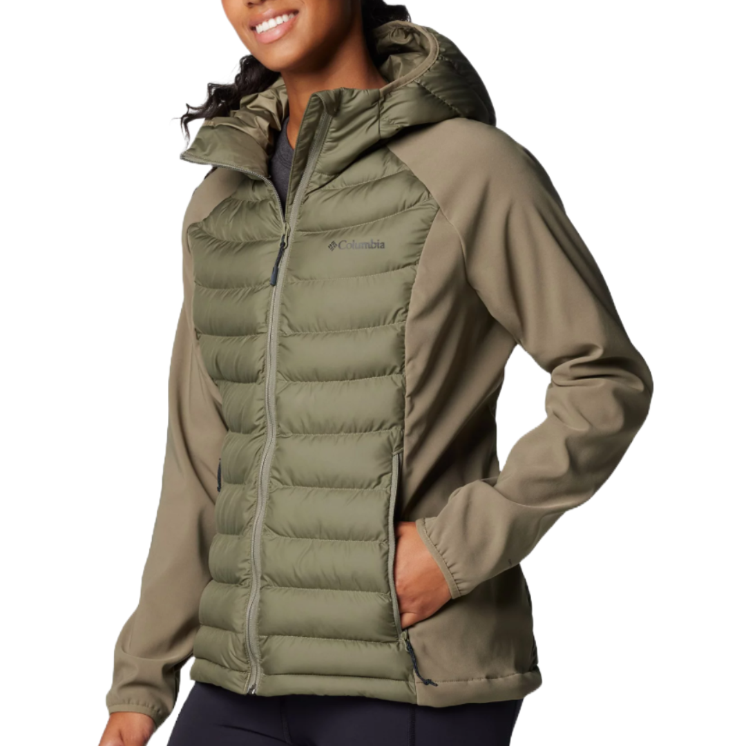 Columbia Powder Lite Hybrid Jacket is an olive green, hooded jacket with quilted front panels for insulation and soft fabric sleeves and sides, featuring side pockets and a front zipper.
