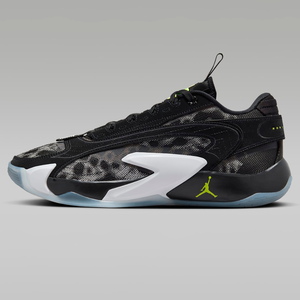 A pair of black and white basketball sneakers with a Jumpman logo.