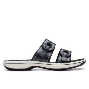 Black sandal with two adjustable straps and a white cushioned sole.