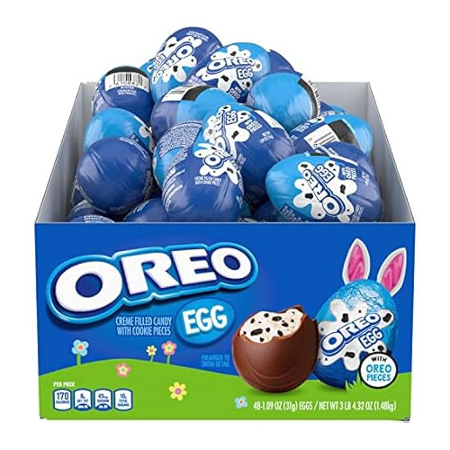 48-count Oreo Cream Filled Eggs with cookie pieces, packaged in blue wrapping, featuring a box design with spring and Easter-themed graphics. Each egg is 1.09 oz (31g).