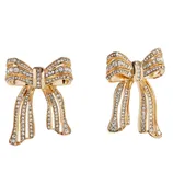 Gold-tone earrings shaped like bows, adorned with rows of sparkling rhinestones.