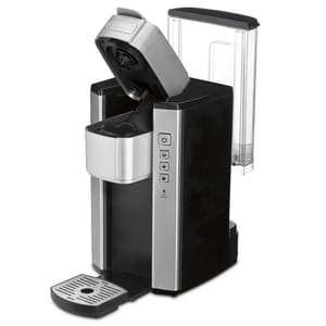 A single-serve coffee maker with a sleek design, featuring a removable water reservoir, a drip tray, and a capsule insertion area with the lid open.