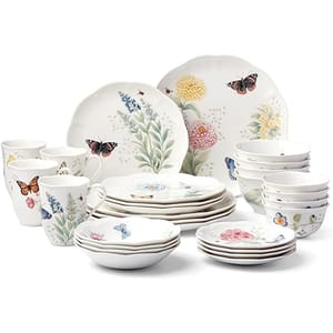 28-piece Lenox Butterfly Meadow Set featuring dinner plates, salad plates, mugs, and bowls, all adorned with colorful butterfly and floral designs on white porcelain.